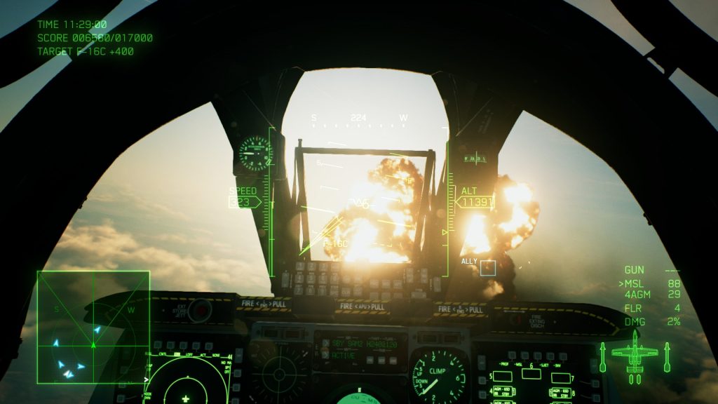 Cockpit view dog fight screen capture with enemy plane explosion from Ace Combat 7: Skies Unknown.